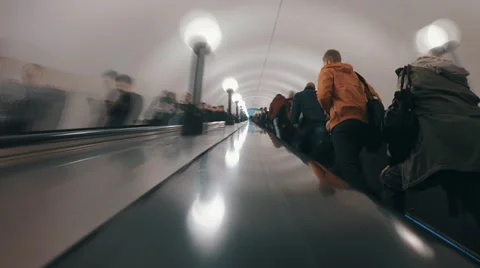 Metro passengers are using the escalators Stock Footage 64738306