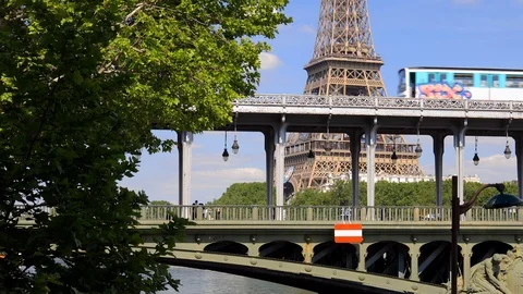 Metro passing on the Bir Hakeim bridge over the river Seine in Paris France Stock Footage 126399064