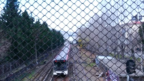 Metro train approaches from an open station Stock Footage 260526978