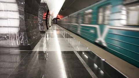Metro train arrives at an empty subway station Video stock 73936107