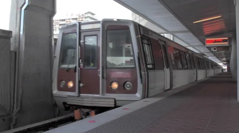 Metro Train Arrives at Station Stock Footage 66456957