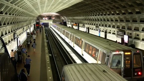 Metro train arrives at underground station downtown Stock Footage 82010976