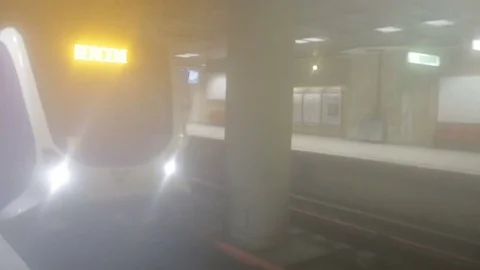 Metro train arriving in underground station Video stock 72083935