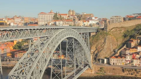 Metro Train on the Bridge Built by Eiffel in Porto, Portugal Stock Footage