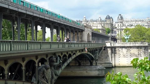 The metro train on the de Bir-Hakeim bridge Stock Footage 107440309