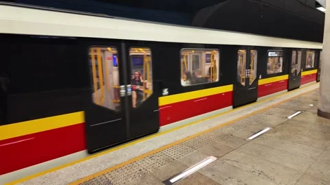 Metro train departing from Centrum Nauki Kopernik station in Warsaw, Poland. Stock Footage 342318980