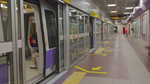 Metro train departing from Garibaldi FS station on Milan M5 line Stock Footage 336901396