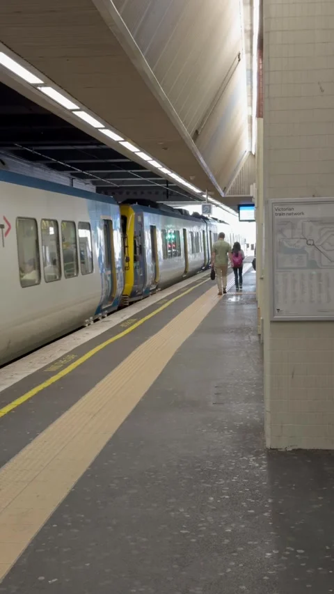 Metro Train Departing Platform at Melbourne Station Stock-Footage 323493554