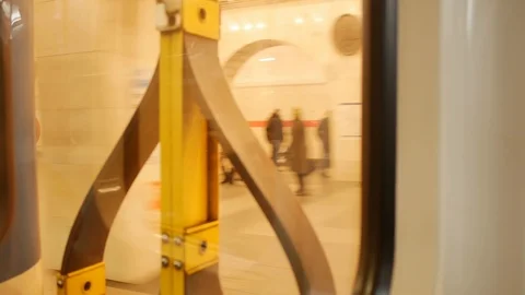 The metro train departs from the station. view from the window of the car Stock Footage 125697337