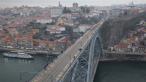 Metro train at Dom Luis bridge in Porto Stock Footage 122999947