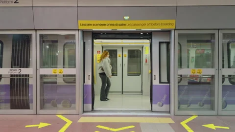 Metro train doors closing at Garibaldi FS station on Milan M5 line Stock Footage 336901378