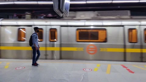 Metro train fast moving arriving at station to stop at evening 스톡 동영상 219442079