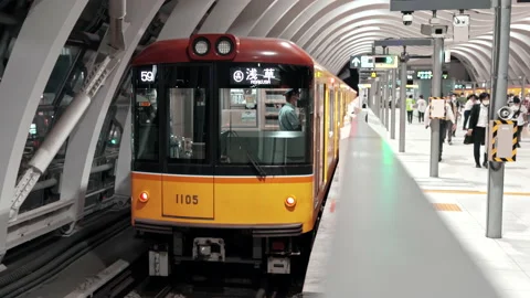 Metro Train on Ginza line waiting for passengers at Shibuya Station Stock-Footage 219279575