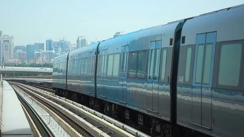 Metro train going away Stock Footage 72659391