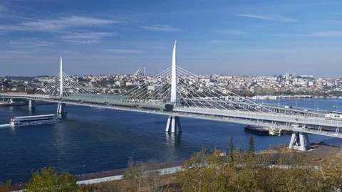 Metro train move to Halic station at cable stayed bridge over Golden Horn Stock Footage 83314231