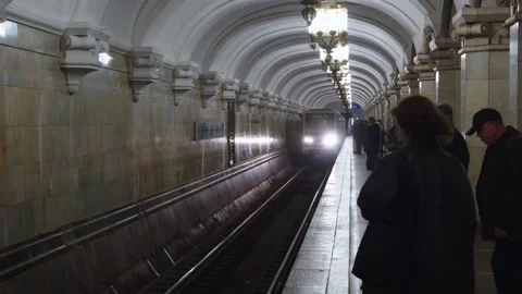 Metro train with the name of the route 22 in russian arrives at the subway Stock Footage 202049170