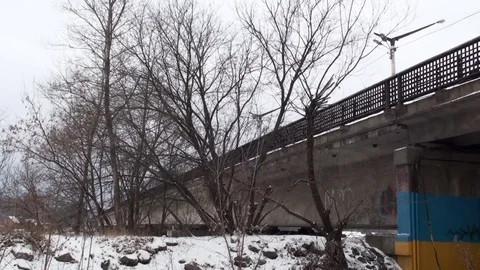 The metro train passes along the bridge Stock Footage 77824995