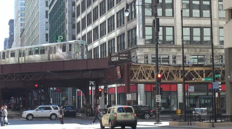 Metro train passing and traffic street in Chicago Illinois USA commuting in city Stock Footage 24428112