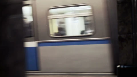 Metro train passing by Stock Footage 34087910