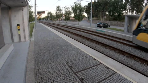 Metro train passing through Azurara Metro Station in Porto, Portugal Stock Footage 133139152