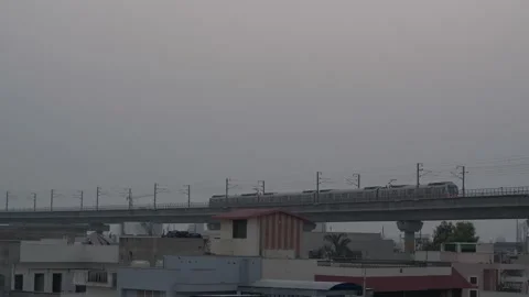 Metro Train passing through a town on an elevated track. jaipur city. Stock-Footage 148929779