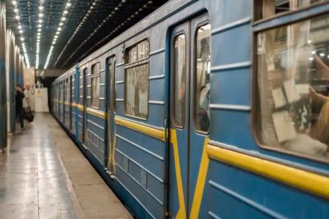 Metro train on the platform. Blue subway train on the underground station. se Stock Photos