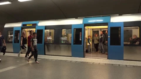 Metro train shuts its doors to depart from station's platform Stock Footage 67384912