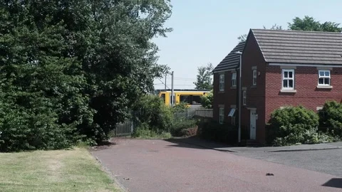 Metro Train in Suburban Gateshead Stock Footage 343885943