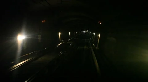 Metro train in underground tunnel Stock Footage 59756571