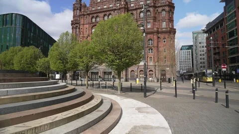Metro Tram passing Peterloo Massacre Monument, Manchester, Lancashire, England Stock Footage 273992734