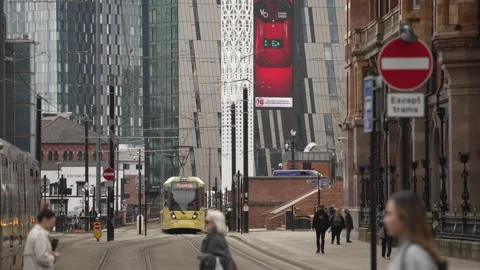 Metro Trams and Deansgate Square, Manchester, Lancashire, England Stock Footage 273992750