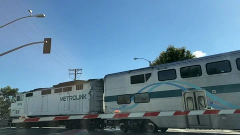 Metrolink Crossing Gates Stock Footage 104101019