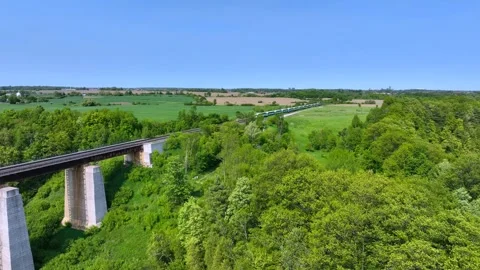 Metrolinx GO Transit Commuter Train On Georgetown Ontario Railway Trestle Bridge 스톡 동영상 310686092