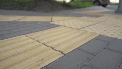 Metropolitan navigation: Elevated view of tactile pavement with braille markings Stock Footage 278590326