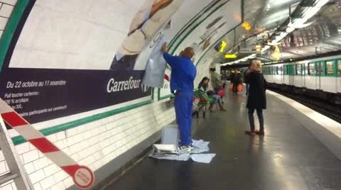 Metropolitan train station in Paris changing advertisement 動画素材 12654706