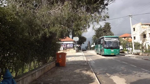 Metula main street - Egged Bus driving Stock Footage 107054704
