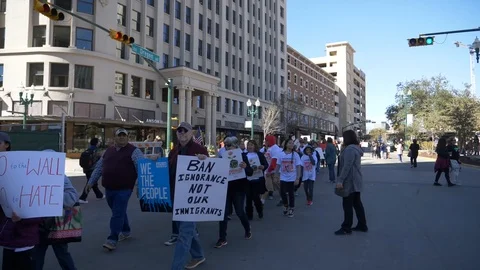 Mexican American border wall protestors, in downtown El Paso, TX Stock Footage 126865016