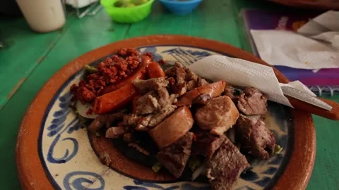 Mexican Blue Corn Sope With Chorizo Sausage And Mixed Grilled Meat On Plate Stock Footage 345181396