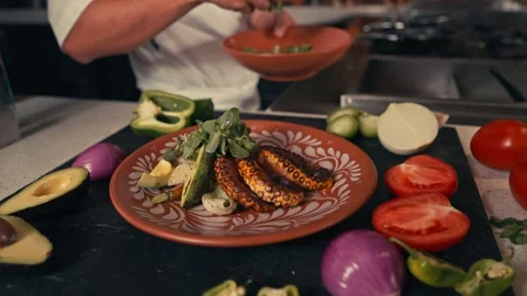 Mexican Chef is Preparing Mexican dishes for dinner at a resort hotel Stockbeeldmateriaal 280704143