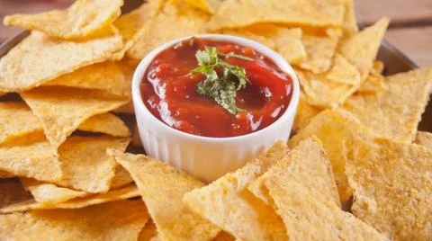 Mexican corn chips nachos with salsa dip Photos