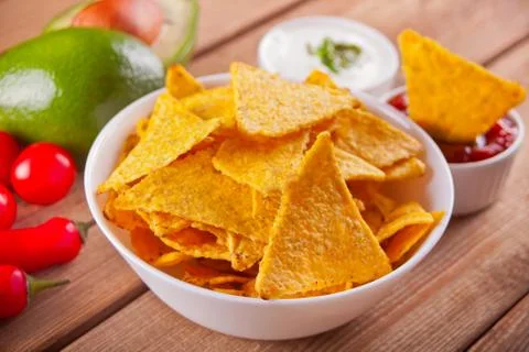 Mexican corn chips nachos with salsa dip Stock Photos