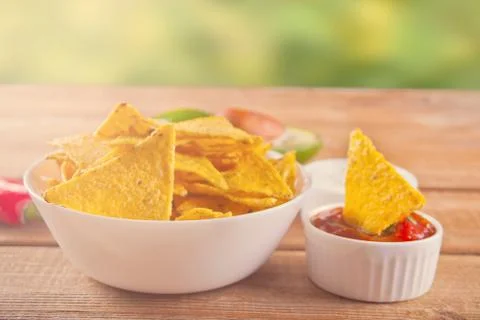 Mexican corn chips nachos with salsa dip 库存照片