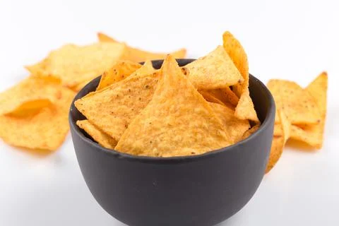 Mexican corn nachos chips, isolated on white background Stock Photos