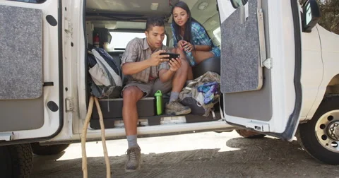 Mexican couple getting ready to go on their hike Video stock 58249725