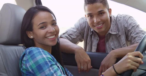 Mexican couple smiling at camera Видео 58256115