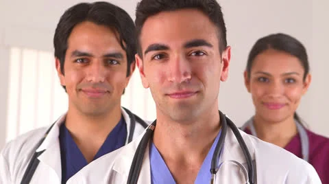 Mexican doctors talking on their coffee break Stock Footage 25629890