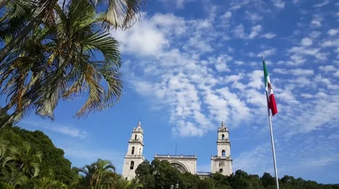 Mexican flag and the Mérida Cathedral in Merida Stock Footage 59508721