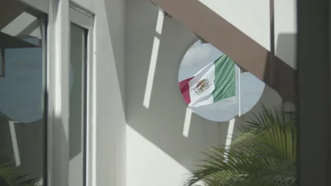 Mexican flag blowing in the wind in slow motion. 스톡 동영상 244822920