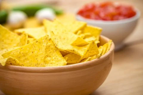 Mexican Nacho Chips and Salsa Dip arrangement on the Table Stock Photos