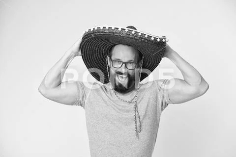 Mexican party. Man on smiling face in sombrero hat celebrating, yellow Stock Photos